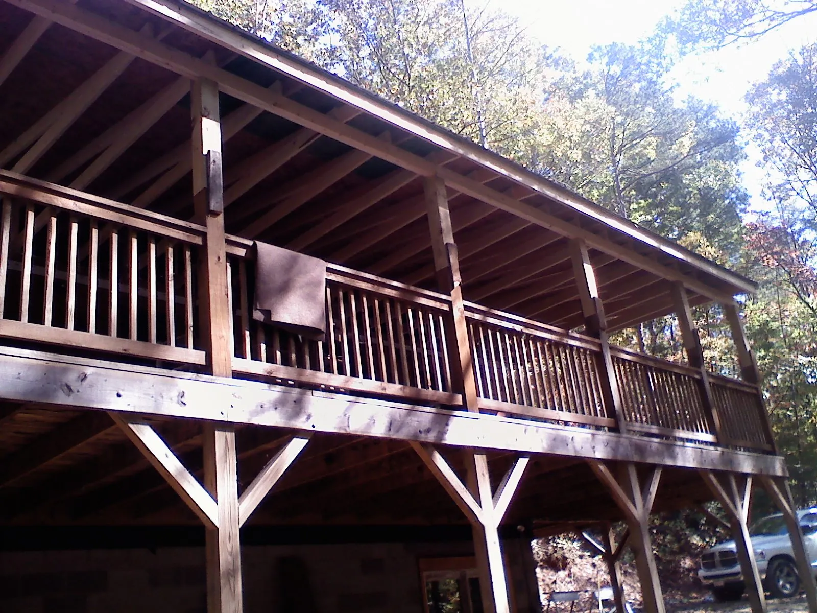 Timber framing under a new elevated porch and deck — Roof Leak Repair in Crystal Beach by Roofing Brothers